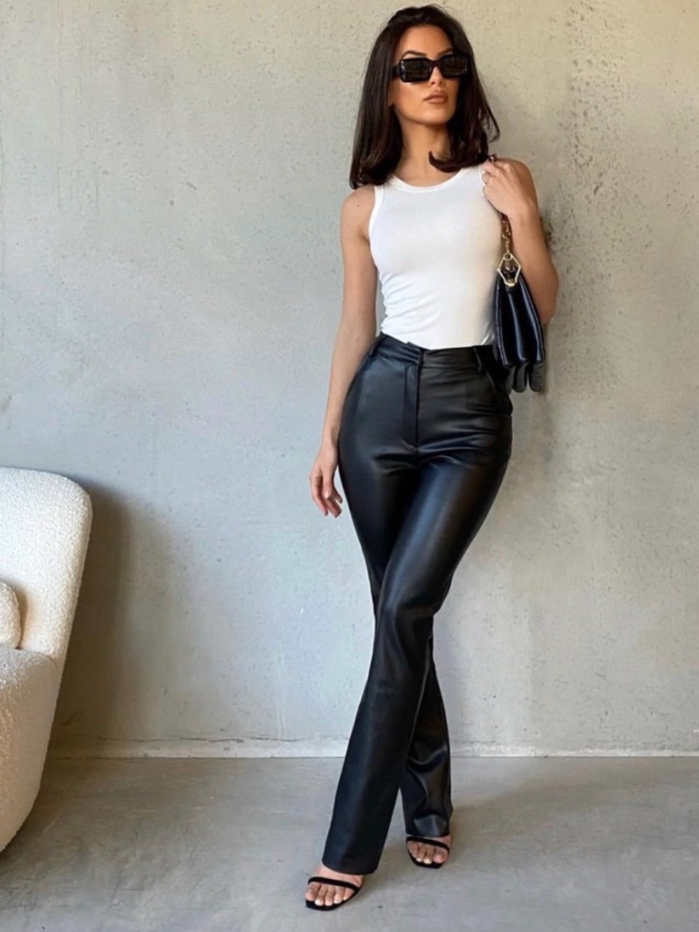 Meshki Tyra Faux‎ Leather Flare Pants in Black.